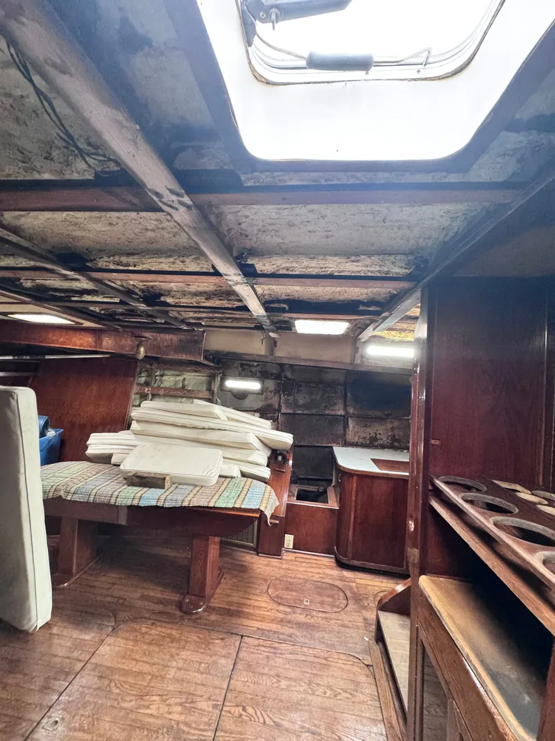 Slide: The Image of Interior of a 1999 Bruce Roberts 64 Custom Steel Cruiser with wood paneling. - 21