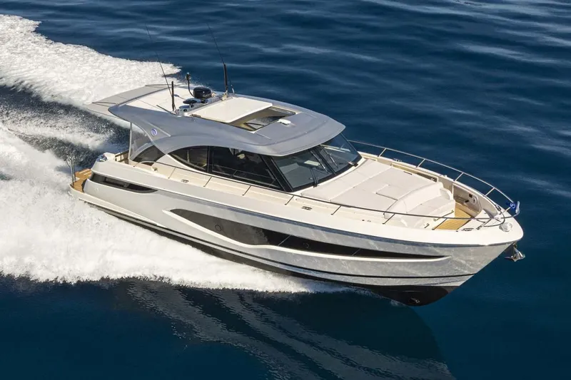 Slide: The Image of Manufacturer Provided Image: 2026 Riviera 4300 Sport Express yacht cruising on open water. - 7