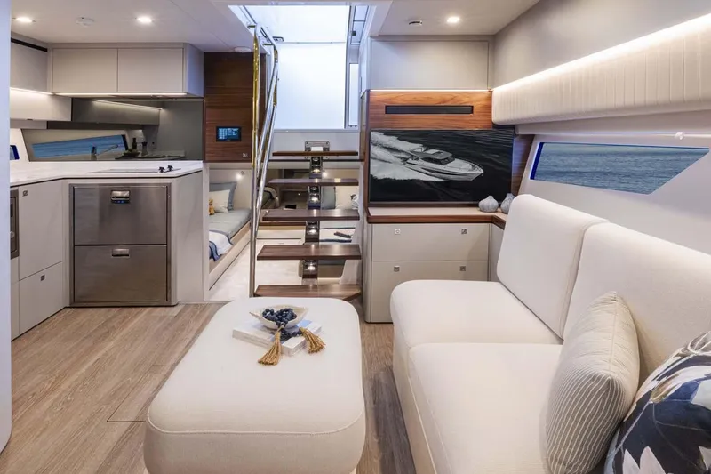 Slide: The Image of Manufacturer Provided Image: Luxurious interior of 2026 Riviera 4300 Sport Express yacht with modern furnishings and elegant design. - 9