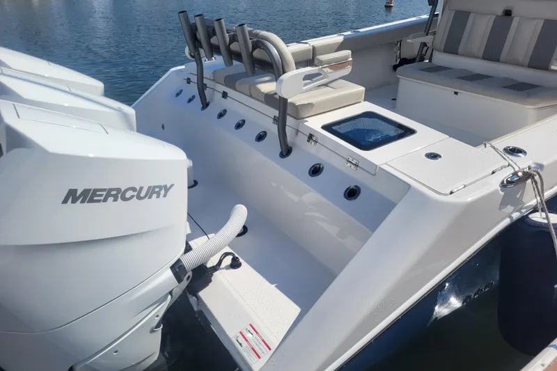 Slide: The Image of 2026 Solace 37 Pilot boat with Mercury engines, featuring a sleek deck design. - 10