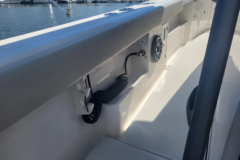 Slide: The Image of 2026 Solace 37 Pilot boat deck with speaker and coiled cable. - 22