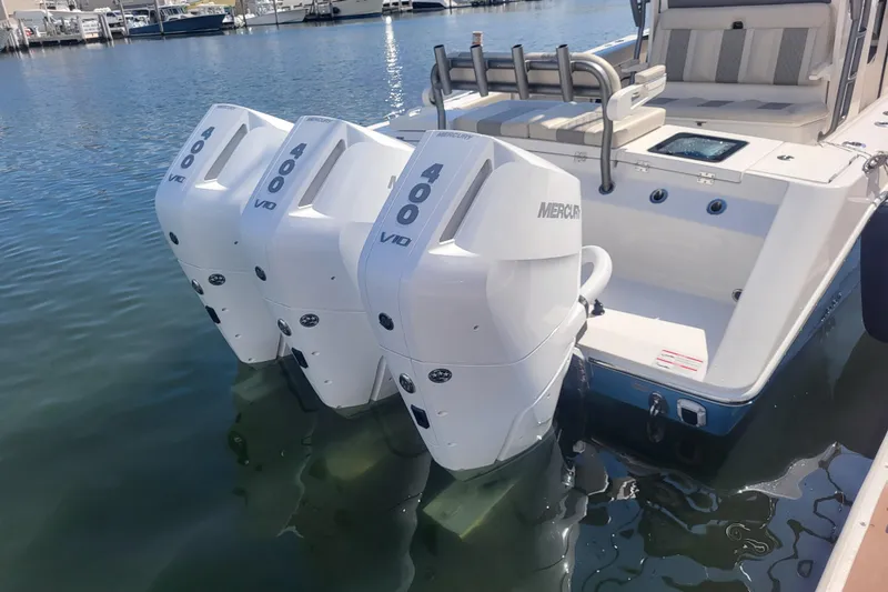 Slide: The Image of 2026 Solace 37 Pilot boat with triple Mercury 400 V10 engines docked in marina. - 29