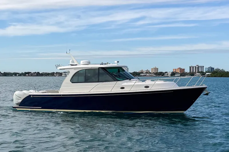 The Image of Hinckley Sport Boats 40x 2021 on water, blue sky. - 1