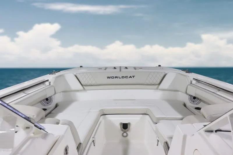 Slide: The Image of Manufacturer Provided Image: 2026 World Cat 280 DC-X boat interior with ocean view, featuring sleek white seating. - 4