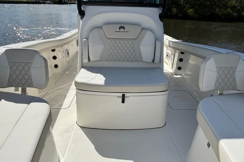 Slide: The Image of 2026 World Cat 325 CC boat interior with luxurious seating and elegant design. - 19