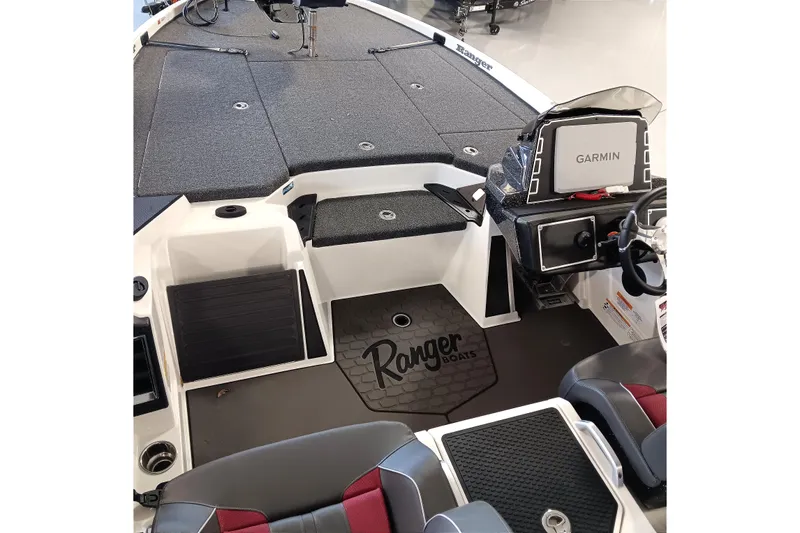 Slide: The Image of 2025 Ranger Z520 boat interior with Garmin system and Ranger Boats logo. - 12