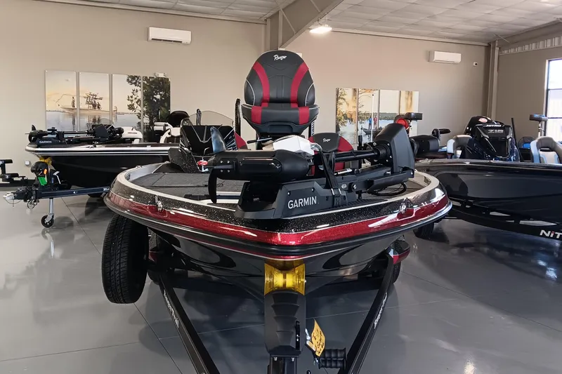 Slide: The Image of 2025 Ranger Z520 boat in showroom, featuring Garmin equipment and sleek design. - 3