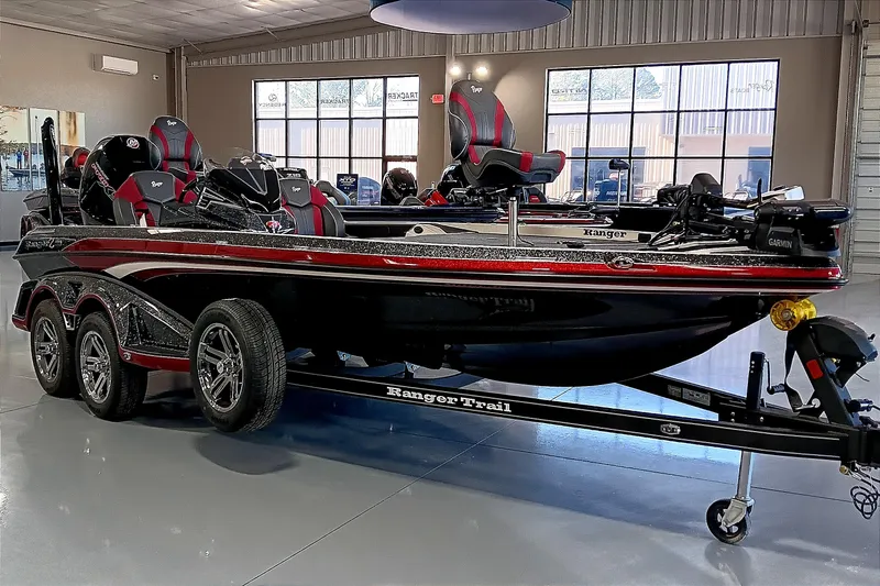 Slide: The Image of 2025 Ranger Z520 boat in showroom, featuring sleek design and modern equipment. - 8
