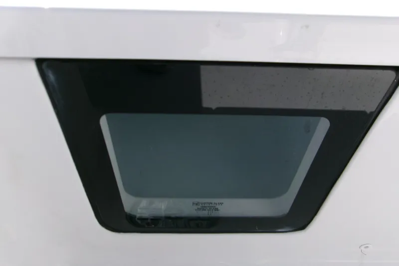 Slide: The Image of Window detail of 2026 Sportsman Masters 247 Bay Boat, showcasing sleek design. - 11