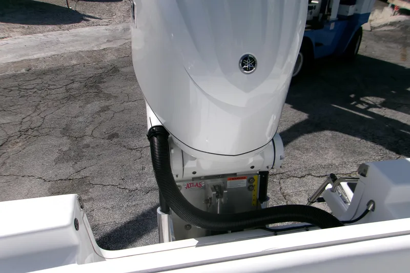 Slide: The Image of 2026 Sportsman Masters 247 Bay Boat engine detail with hydraulic steering system. - 12