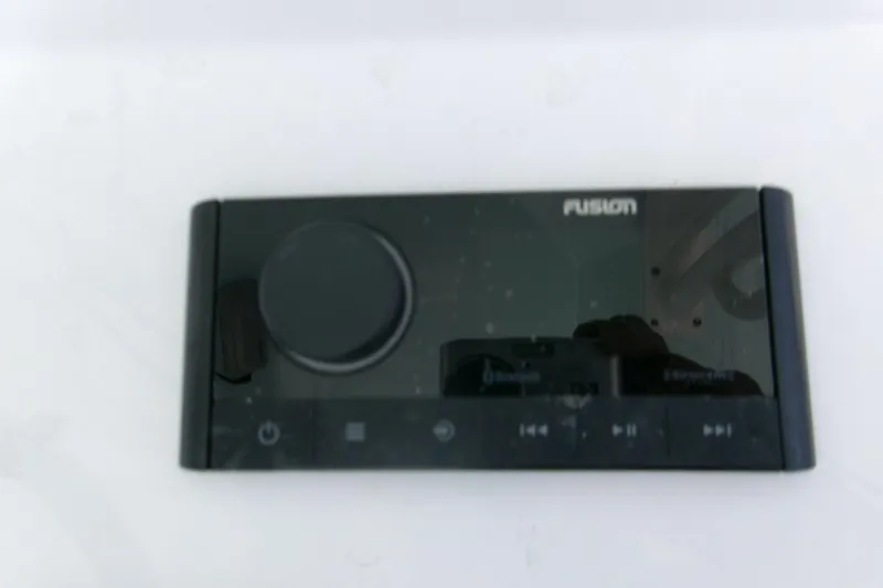 Slide: The Image of Fusion audio control panel on 2026 Sportsman Masters 247 Bay Boat. - 14