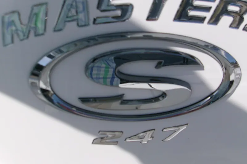 Slide: The Image of 2026 Sportsman Masters 247 Bay Boat logo with chrome detailing. - 15