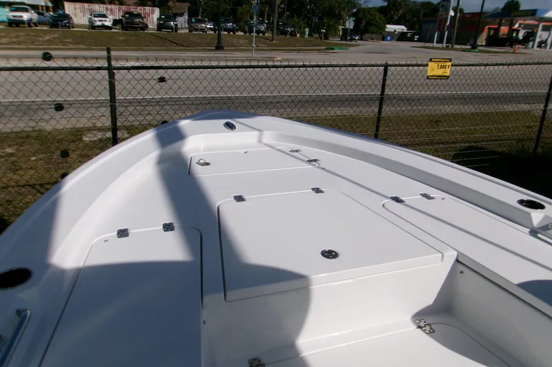 Slide: The Image of 2026 Sportsman Masters 247 Bay Boat deck view, showcasing storage compartments and sleek design. - 7