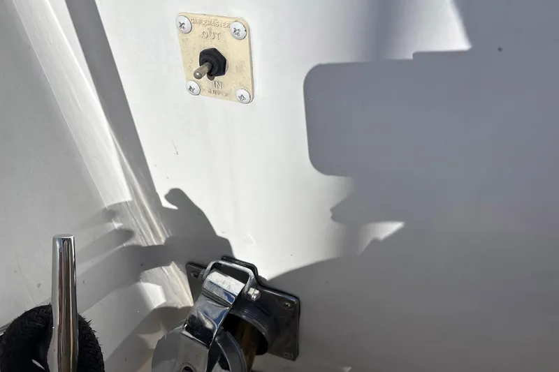 Slide: The Image of Close-up of a 1999 Carver 530 Voyager Pilothouse boat switch and cleat. - 20