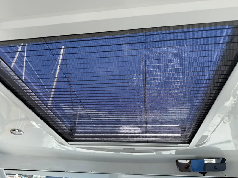 Slide: The Image of Skylight view from 2021 Beneteau Antares 8 boat, showcasing sleek design and modern features. - 14