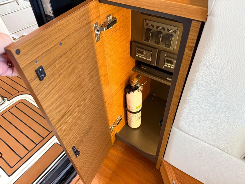 Slide: The Image of Interior of 2023 Tiara Yachts C39 Coupe with modern helm console. - 46