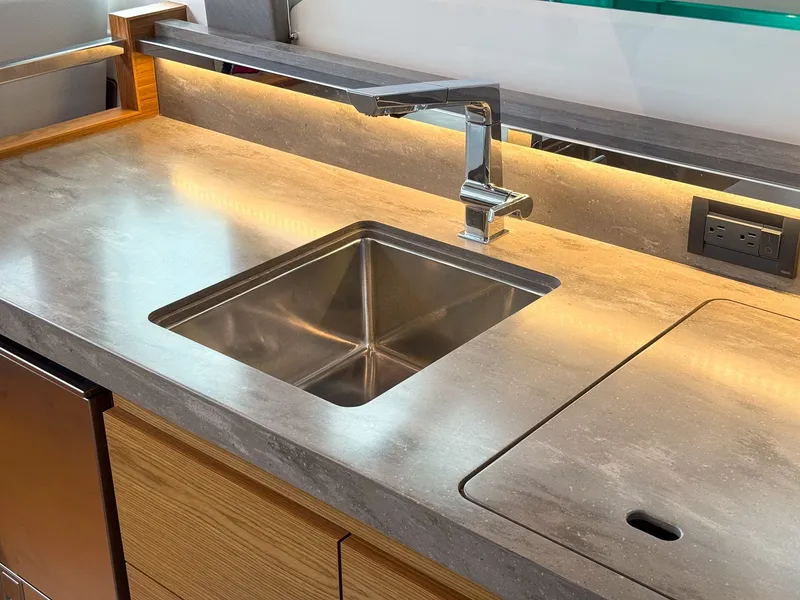 Slide: The Image of 2023 Tiara Yachts C39 Coupe with open roof in interior view. - 49