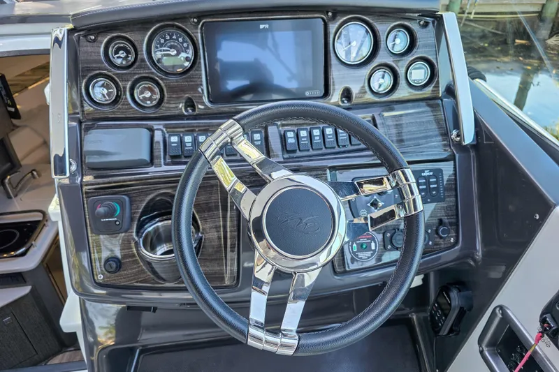 Slide: The Image of Tachometer showing 248.9 engine hours on 2022 Monterey 295 Sport Yacht. - 11