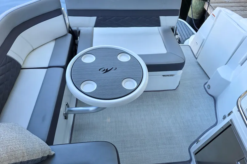 Slide: The Image of 2022 Monterey 295 Sport Yacht interior detail with sleek white panel and chrome fixtures. - 14