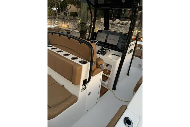 Slide: The Image of 2021 Sea Hunt Gamefish 30 Forward Seating boat interior with Garmin navigation system. - 20