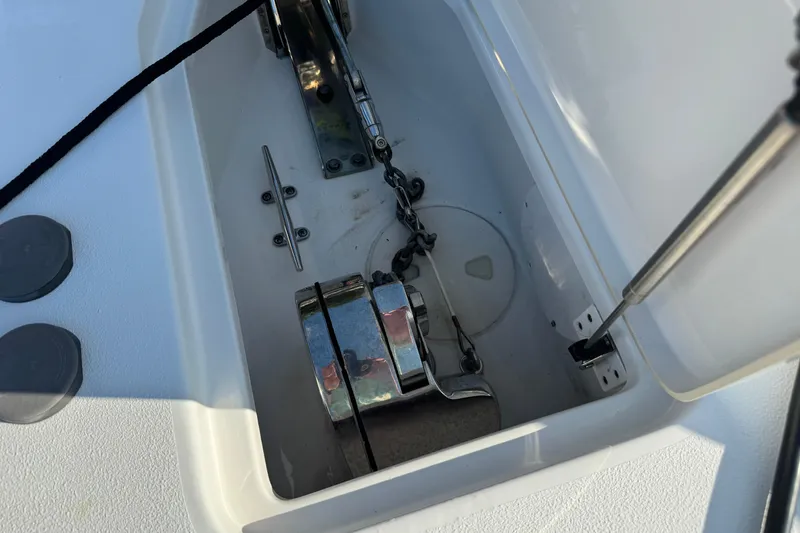 Slide: The Image of Anchor compartment of 2021 Sea Hunt Gamefish 30 Forward Seating boat. - 8