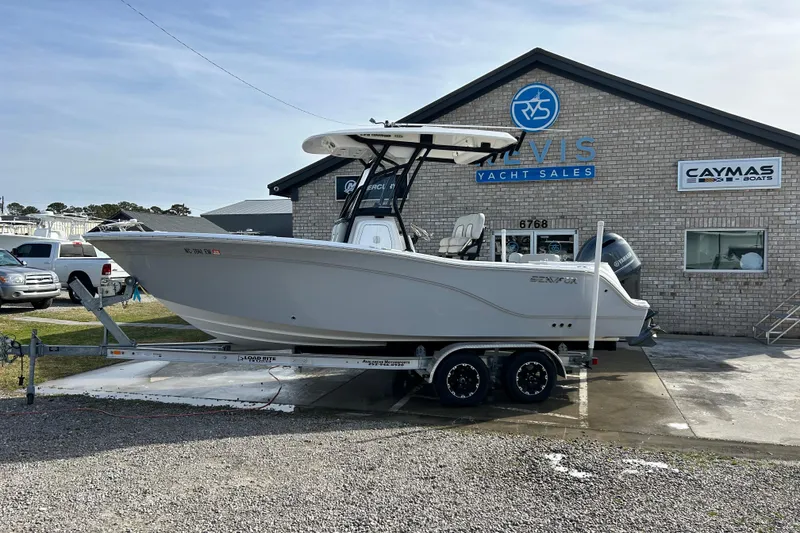 Slide: The Image of 2022 Sea Fox 228 Commander boat on trailer at yacht sales dealership. - 1
