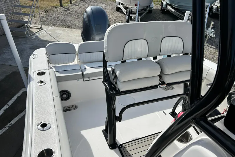 Slide: The Image of 2022 Sea Fox 228 Commander boat interior with seating and motor view. - 15