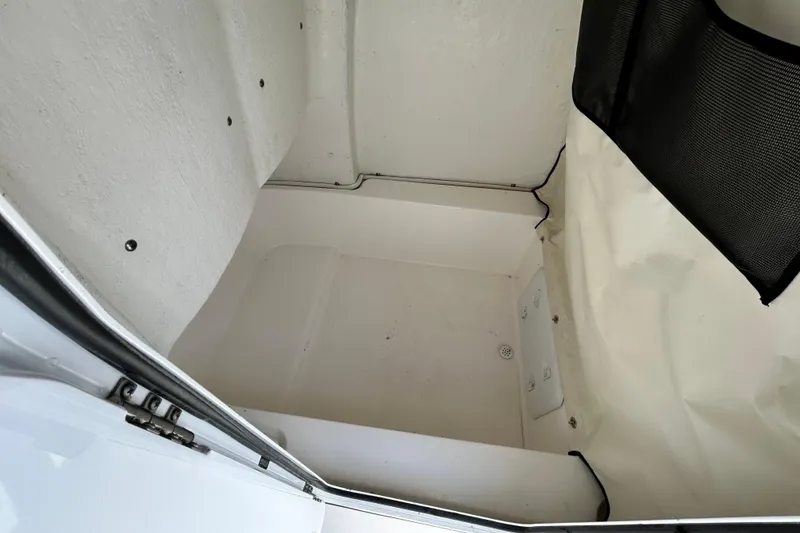 Slide: The Image of 2022 Sea Fox 228 Commander storage compartment interior view. - 19