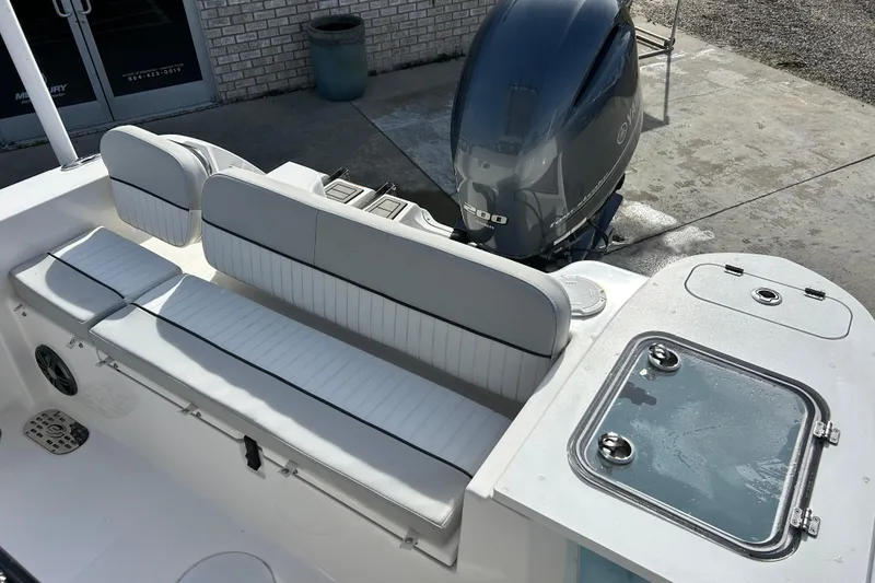 Slide: The Image of 2022 Sea Fox 228 Commander boat interior with seating and Yamaha 200 engine. - 21