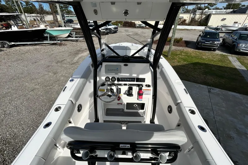 Slide: The Image of 2022 Sea Fox 228 Commander boat interior with Garmin navigation system and steering console. - 24