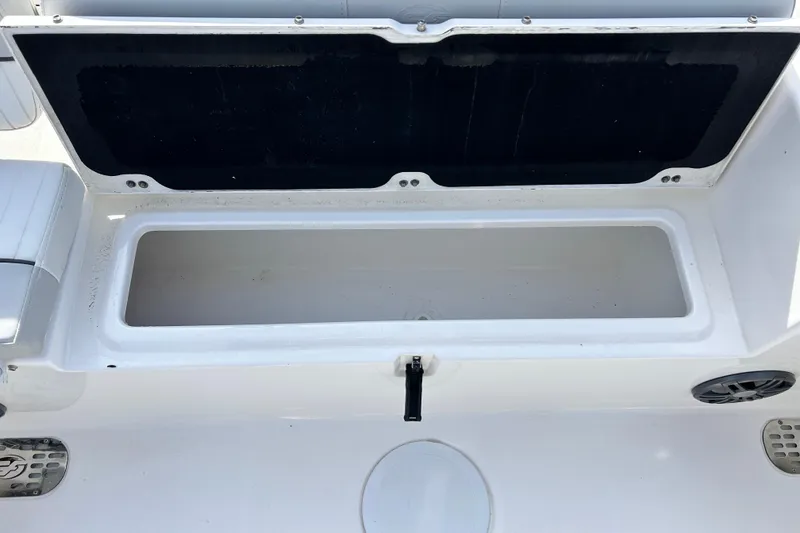 Slide: The Image of Open storage compartment on 2022 Sea Fox 228 Commander boat. - 32