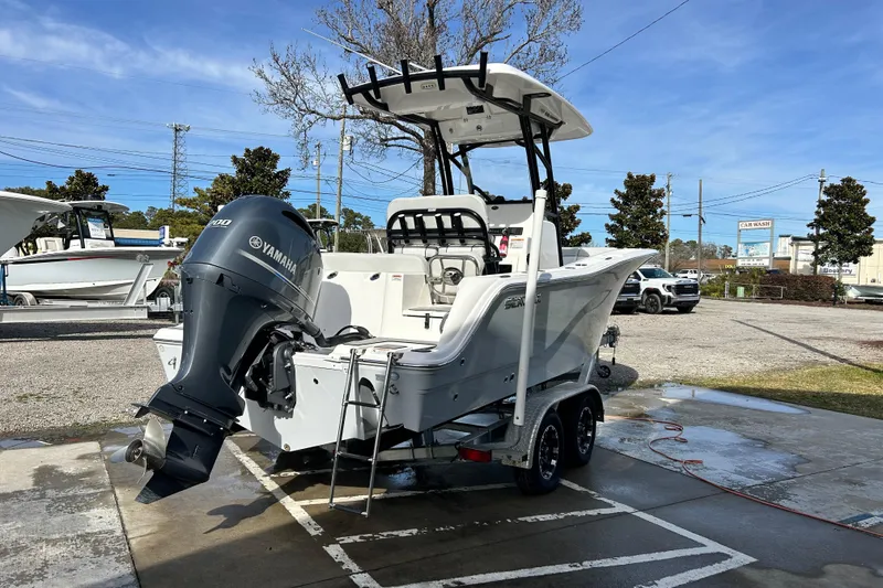 Slide: The Image of 2022 Sea Fox 228 Commander boat with Yamaha engine on trailer in parking lot. - 5