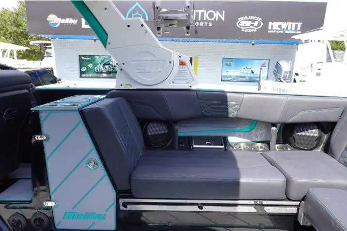 Slide: The Image of 2022 Malibu Wakesetter 25 LSV interior with sleek seating and modern design. - 13