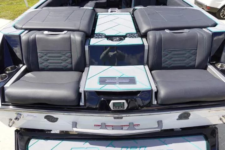 Slide: The Image of 2022 Malibu Wakesetter 25 LSV interior with luxurious seating and modern design. - 7