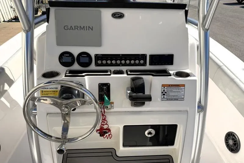 Slide: The Image of 2023 Sea Fox 228 Commander boat console with Garmin navigation system and steering wheel. - 4