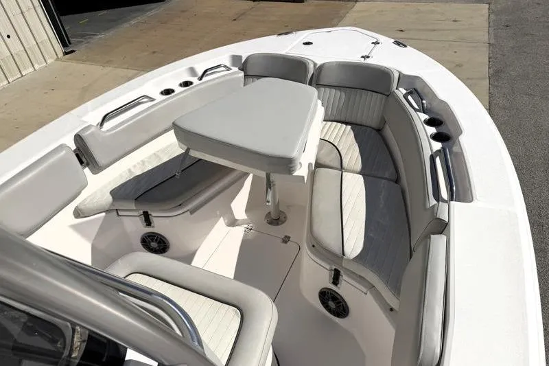 Slide: The Image of 2023 Sea Fox 228 Commander boat interior with seating and table. - 5