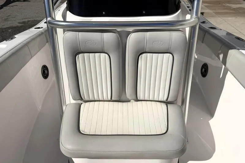 Slide: The Image of 2023 Sea Fox 228 Commander boat seating with white cushioned upholstery. - 6