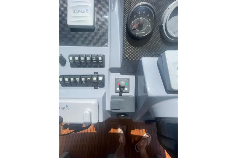 Slide: The Image of Control panel of a 2015 Faeton Formentera boat with Garmin navigation system. - 10