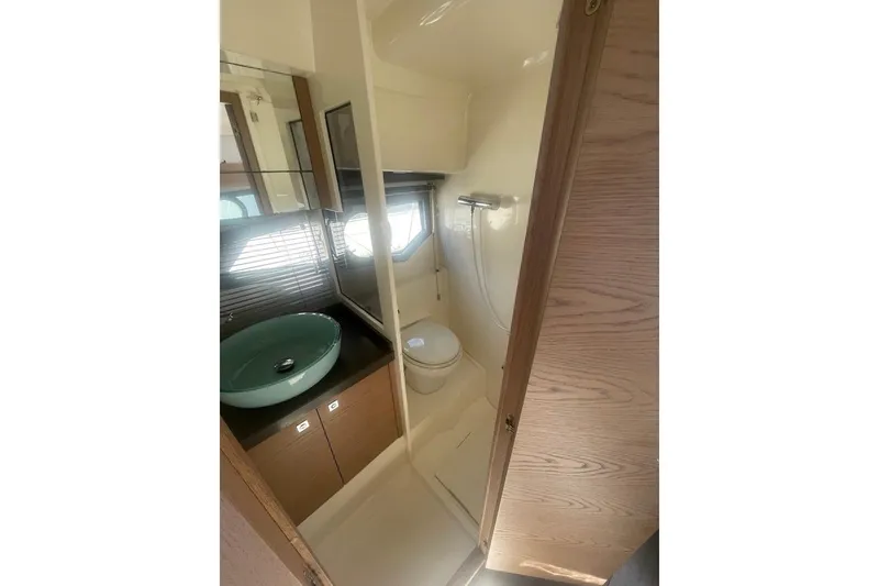 Slide: The Image of 2015 Faeton Formentera boat bathroom with modern sink and shower. - 25