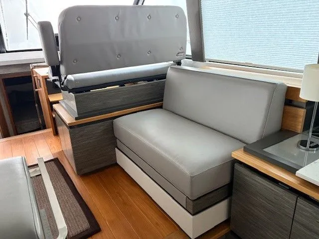 Slide: The Image of Interior of 2020 Tiara Yachts C49 Coupe with gray upholstery. - 13