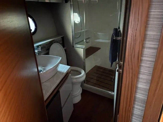 Slide: The Image of Luxurious bathroom in a 2020 Tiara Yachts C49 Coupe. - 26