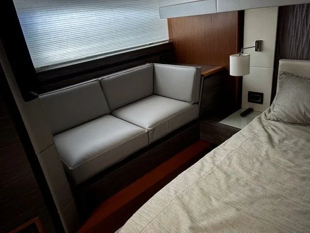 Slide: The Image of Interior of 2020 Tiara Yachts C49 Coupe with sofa and bed. - 32