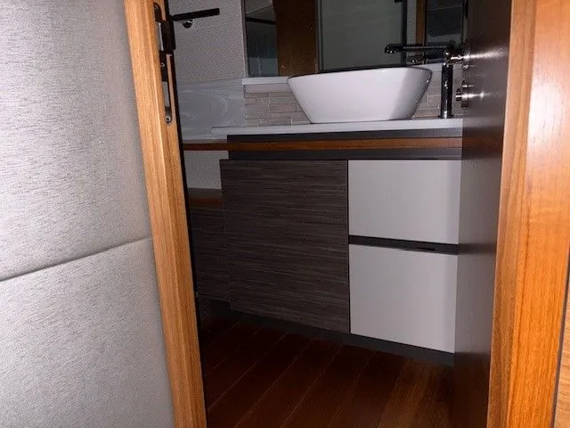 Slide: The Image of Interior of 2020 Tiara Yachts C49 Coupe with modern sink. - 33