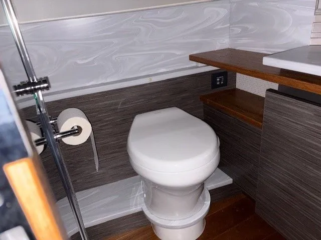 Slide: The Image of Bathroom in 2020 Tiara Yachts C49 Coupe with modern amenities. - 34