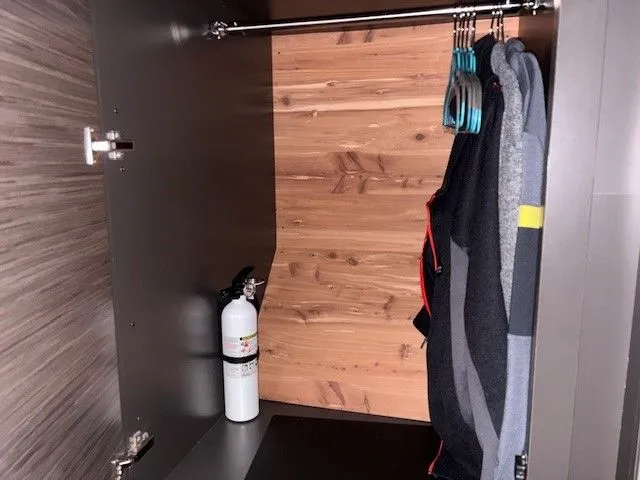 Slide: The Image of Interior of a 2020 Tiara Yachts C49 Coupe with closet. - 36