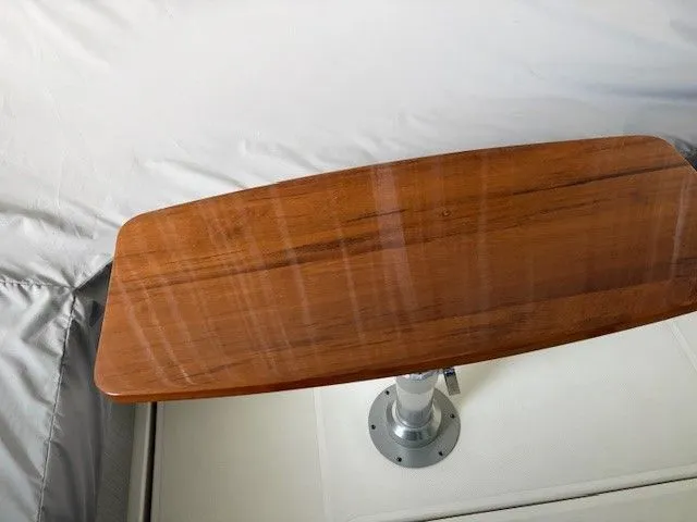 Slide: The Image of Wooden table on a 2020 Tiara Yachts C49 Coupe. - 6