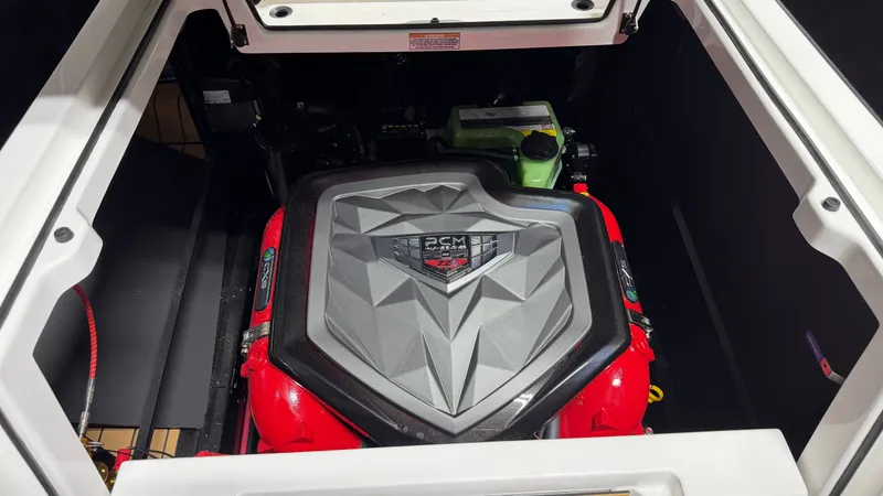 Slide: The Image of Engine compartment of a 2026 Nautique Super Air Nautique G23 with a PCM engine. - 22