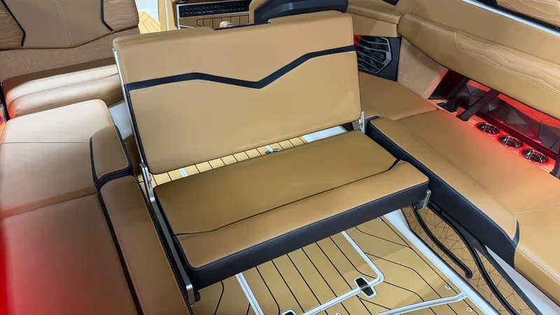 Slide: The Image of Interior of a Nautique Super Air Nautique G23 with beige upholstery and modern details. - 38