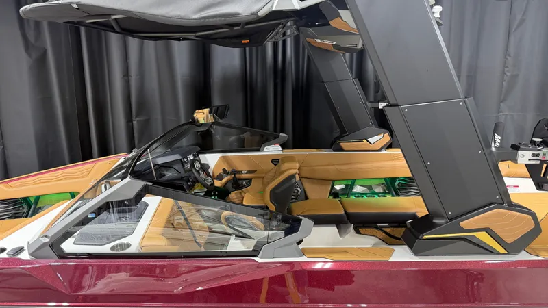 Slide: The Image of The image shows the cockpit of a 2026 Nautique Super Air Nautique G23 with modern seating and controls. - 6