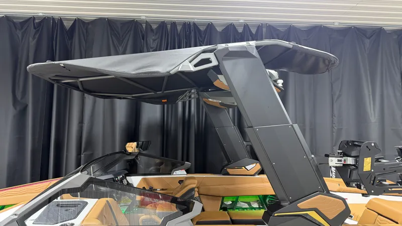 Slide: The Image of The image shows a modern boat cockpit with a large black sunshade. - 7